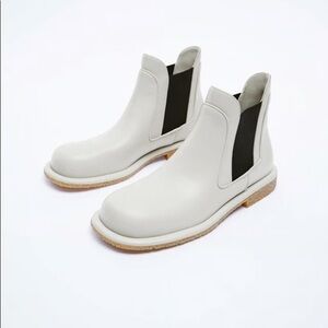Elegant Cream Ankle Boots with Black Panels